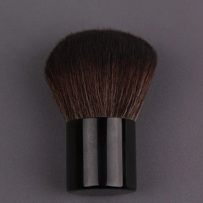 Pink gold makeup brush with round angled top for foundation, blush, concealer, contour, and highlighting blending.