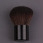Pink gold makeup brush with round angled top for foundation, blush, concealer, contour, and highlighting blending.