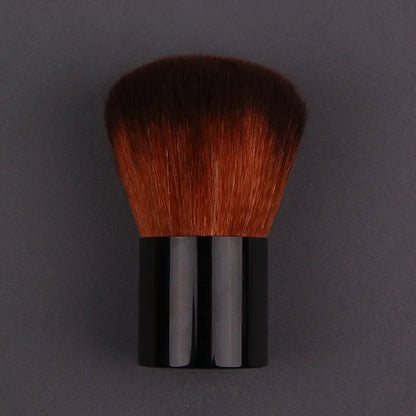 Pink and gold makeup brush with round angled top for foundation, blush, concealer, contour, and highlighting.