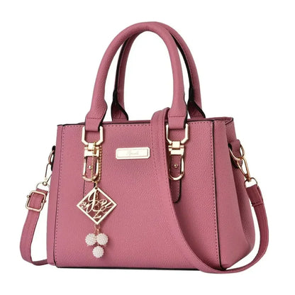 Large pink leather handbag for women, casual shoulder bag with spacious interior and messenger style, by BackupMyFilesNow.com.