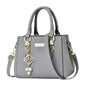 Pink large capacity leather handbag for women, casual shoulder bag with messenger style, suitable for everyday use.