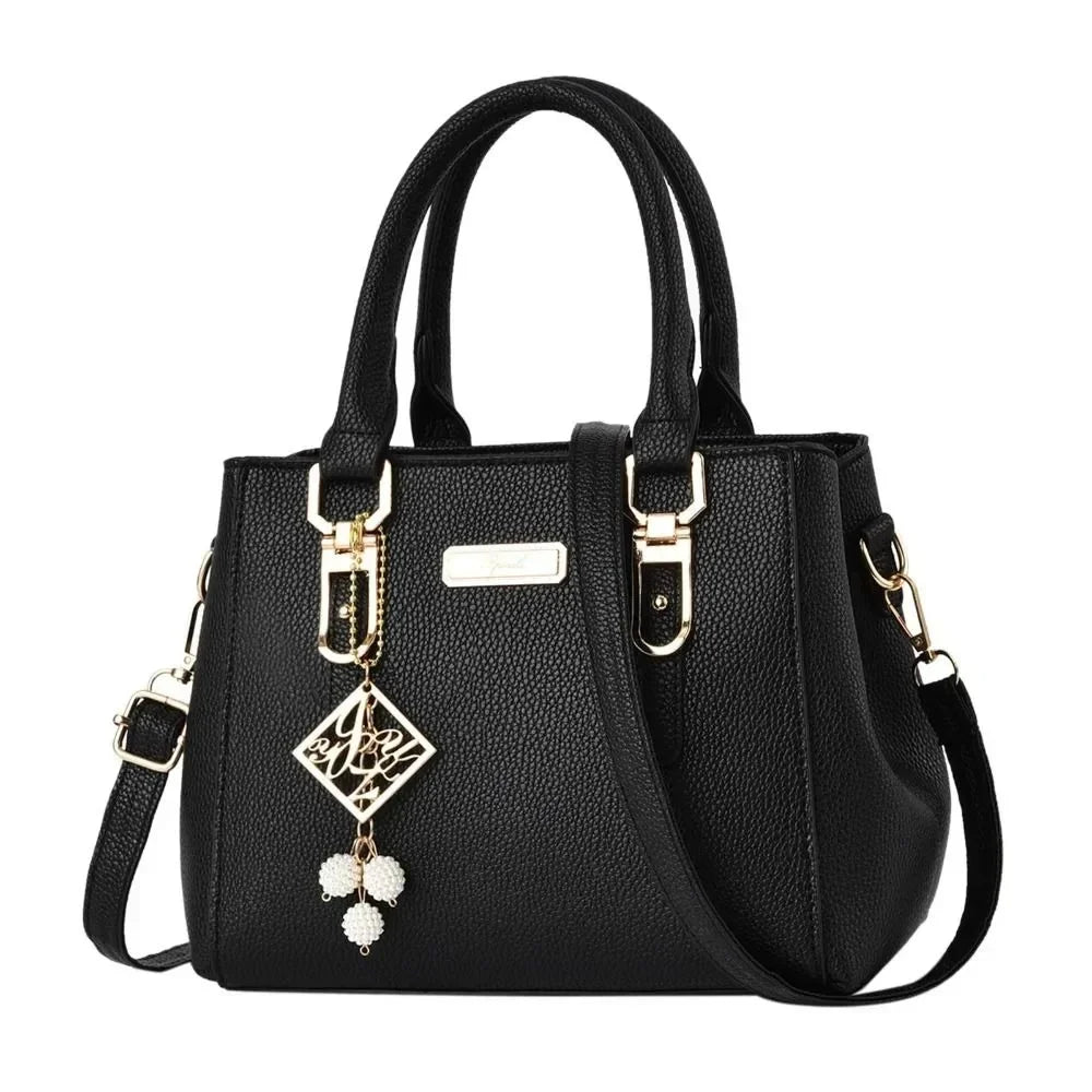 Large capacity pink leather handbag for women, casual shoulder bag with messenger style and multiple compartments.