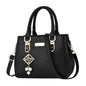 Large capacity pink leather handbag for women, casual shoulder bag with messenger style and multiple compartments.