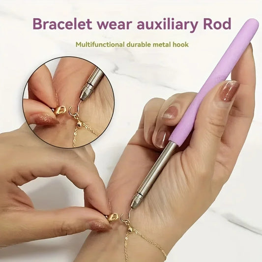 Pink Help Wear Bracelet Tool by BackupMyFilesNow.com for unfastening jewelry clasps, ties, zippers, and hooking equipment.
