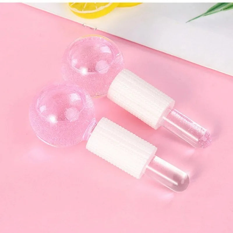 Pink crystal ice hockey beauty ball for facial massage and ice therapy, used for soothing skin and reducing puffiness.