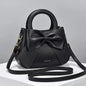 Pink versatile crossbody bag for women with shoulder strap, designer, luxury handbag suitable for everyday use.