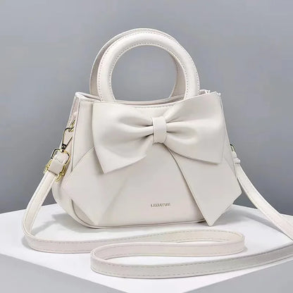 Pink versatile crossbody bag for women, designer shoulder purse, luxury handbag, stylish and functional accessory.