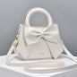 Pink versatile crossbody bag for women, designer shoulder purse and handbag with stylish, luxurious design and multiple carrying options.