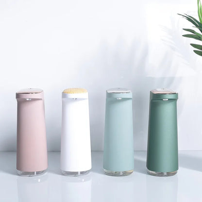 Pink rechargeable automatic soap dispenser for foaming hand soap from BackupMyFilesNow.com, with touchless operation and sleek design.