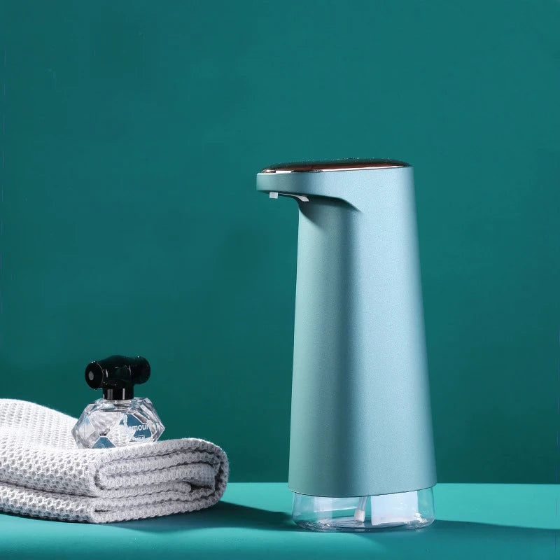 Pink Rechargeable Automatic Soap Dispenser for foaming hand soap by BackupMyFilesNow.com, with touchless operation and sleek design.