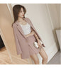 Stylish women's British casual blazer and dress set, featuring a tailored blazer and matching dress for a chic look.