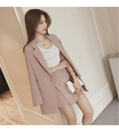 Stylish women's British casual blazer and dress set by BACKUPMYFILESNOW.COM®, featuring a tailored blazer and coordinating dress.