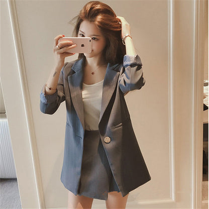 Women's British casual blazer and dress set by BACKUPMYFILESNOW.COM®, featuring a tailored blazer and matching dress in a stylish design.