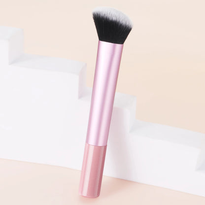 Pink single facial brightening and contouring brush by BackupMyFilesNow.com, ideal for beauty and skincare application.