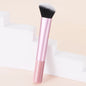 Pink facial brightening and contouring brush by BackupMyFilesNow.com, designed for precise makeup application and blending.