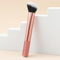 Pink facial brightening and contouring brush by BackupMyFilesNow.com, a versatile beauty tool for flawless makeup application.