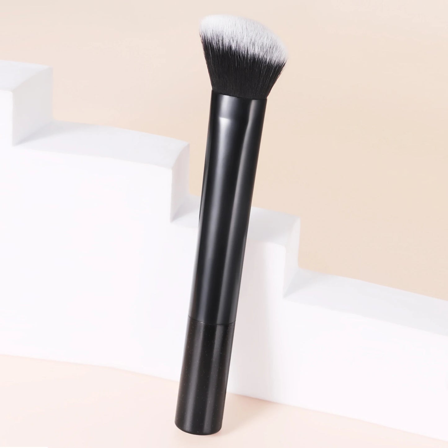 Pink facial brightening and contouring brush by BackupMyFilesNow.com, a versatile beauty tool for flawless skin application.