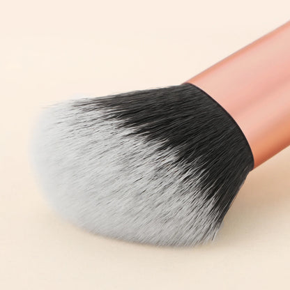 Pink facial brightening and contouring brush by BackupMyFilesNow.com, a versatile beauty tool for skincare and makeup application.