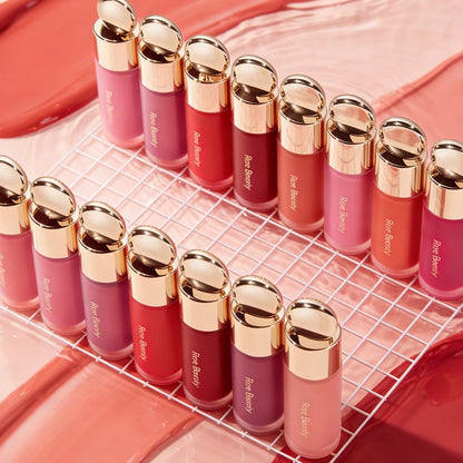 Rare Beauty Liquid Blush in porcelain with a silky smooth texture, easy to blend, high-gloss finish, and reflective mirrors.