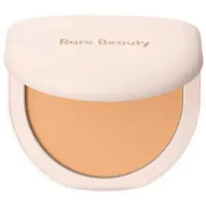 Rare Beauty liquid blush in porcelain shade, silky smooth, easy to blend, high-gloss finish, enhances makeup texture and radiance.