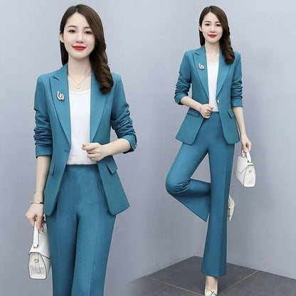 Elegant women's purple office suit for work, featuring a tailored blazer and matching pants, perfect for professional attire.