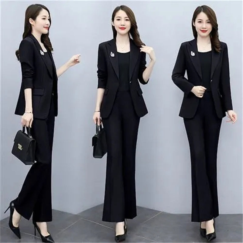 Elegant women's purple office suit for work, featuring a tailored blazer and matching pants, suitable for professional attire.