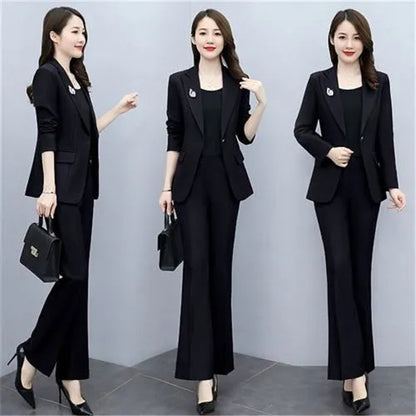 Elegant women's purple office suit for work, featuring a tailored blazer and matching pants, suitable for professional attire.