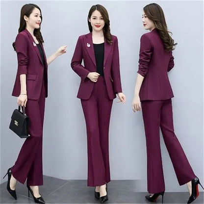 Elegant women's purple office suit for work, featuring tailored blazer and matching pants, suitable for professional attire.