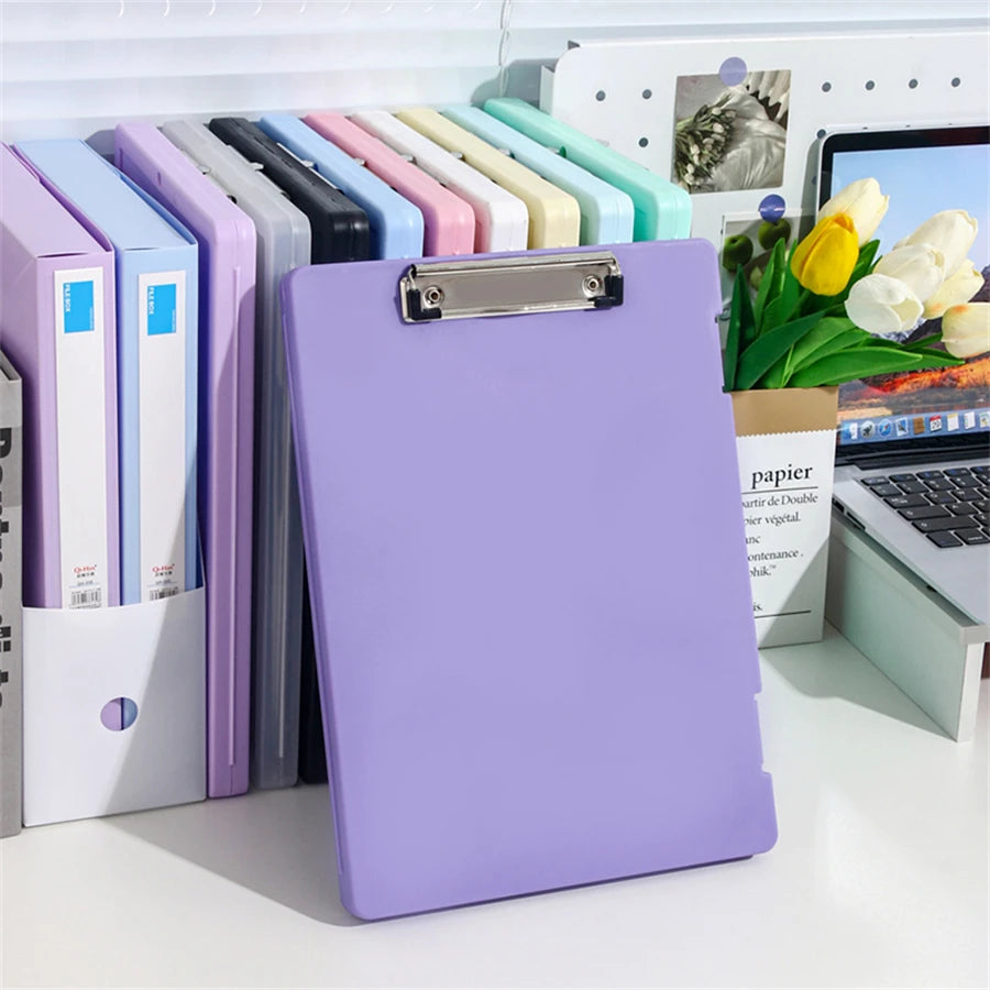 Purple A4 multi-functional file folder from BackupMyFilesNow.com, used for organizing test papers, documents, and writing materials.