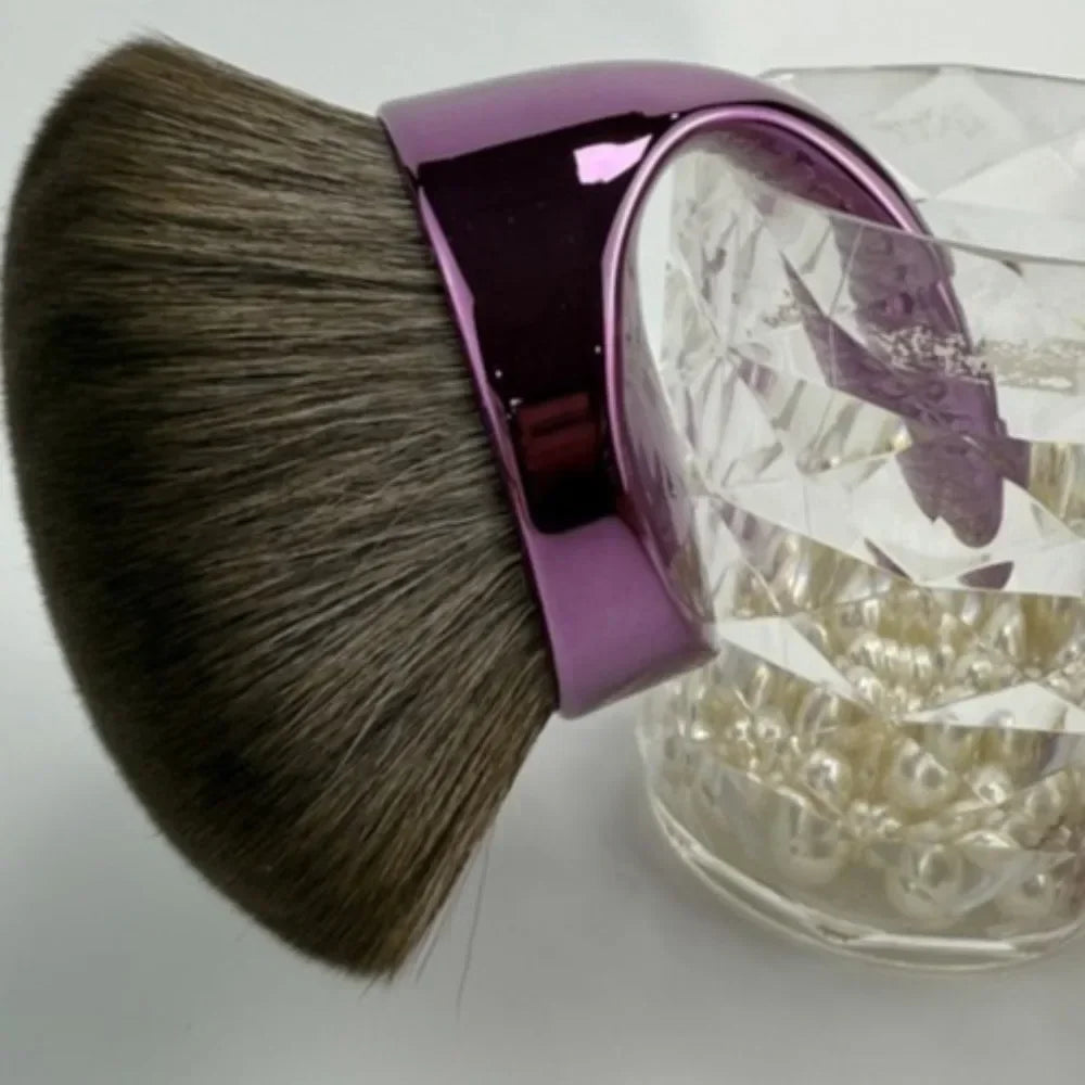 Purple Vegan Body Kabuki Brush with large bristles for blending self-tanner and foundation, professional applicator for smooth skin.