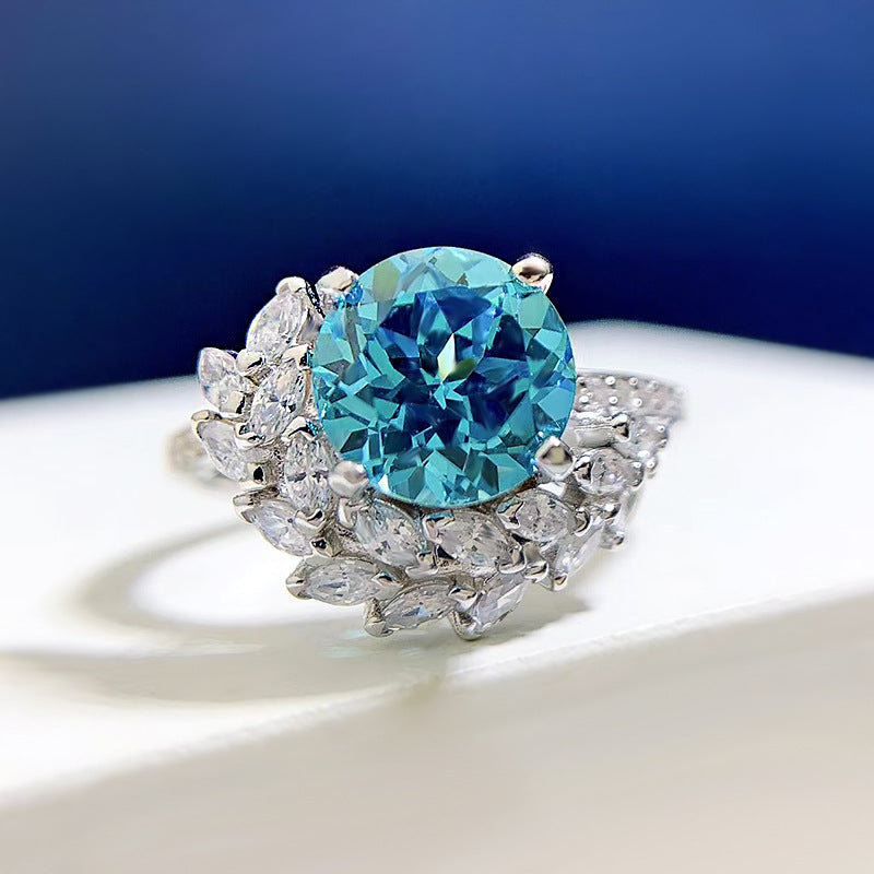 S925 silver round rhinestone engagement ring with sparkling stones, showcasing elegant jewelry design.