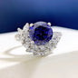 S925 silver round rhinestone engagement ring with sparkling stones, showcasing elegant jewelry design.