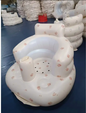 Inflatable baby chair for dining and bath with rainbow colors, designed for comfort and safety during feeding and bathing.
