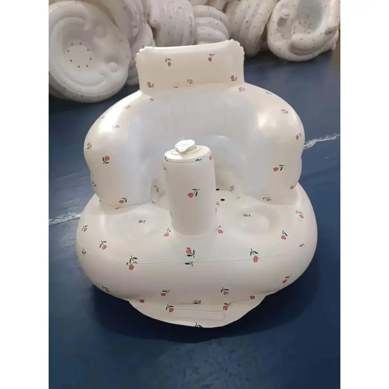 Inflatable baby chair in rainbow colors for dining and bath, designed for infants and toddlers to sit comfortably.