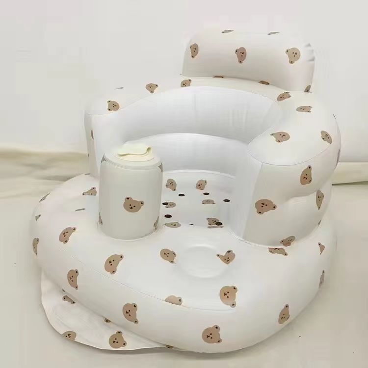 Inflatable baby chair for dining and bath with rainbow design, made by BackupMyFilesNow.com, suitable for infants' comfort and safety.