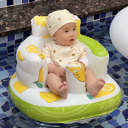 Inflatable baby chair for dining and bath with rainbow design, designed for infants' comfort and safety.