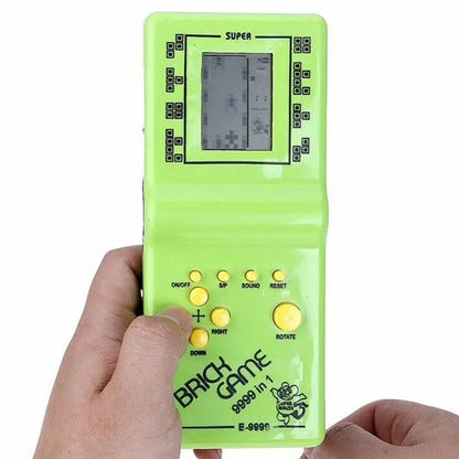Colorful handheld game machine by BackupMyFilesNow.com, classic brick-style toy with kids games, music playback, and simple controls.