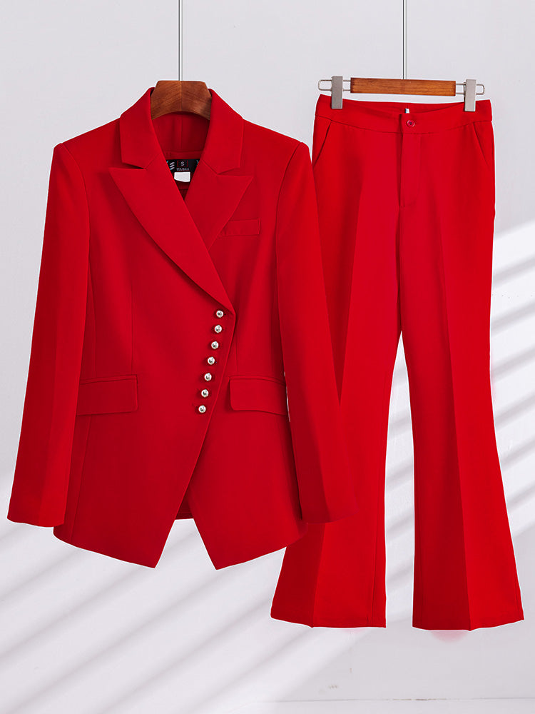 Red two-piece women's business suit with pants, stylish blazer and matching trousers, suitable for professional office wear.