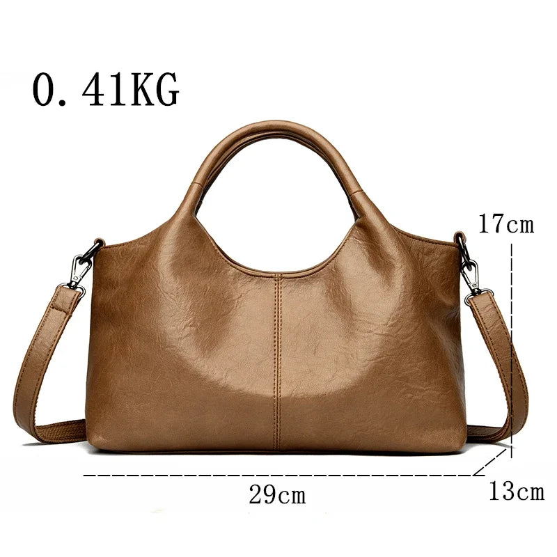 Large red leather women's tote bag with soft, high-quality leather, shoulder strap, and spacious interior for fashion-forward ladies.