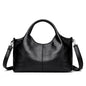 Red leather tote bag for women with large capacity, soft designer leather, shoulder and crossbody style, stylish female handbag.