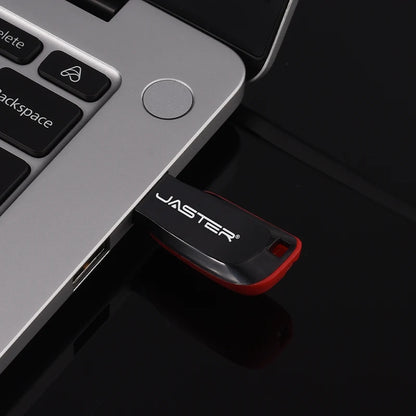 Red plastic pendrive flash drive with key ring, USB 2.0, available in 128MB to 32GB, compatible with car, TV, and computer.