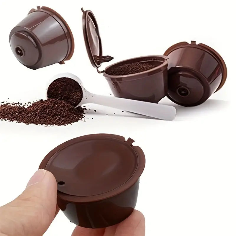 Red reusable coffee capsule filter for coffee machine, compatible with espresso makers, by BackupMyFilesNow.com.