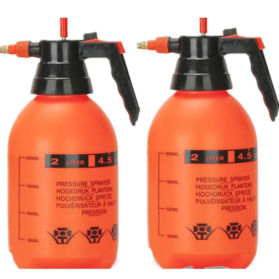 Red watering can with a spray nozzle for indoor plants, garden watering, and flower irrigation, suitable for home gardening.