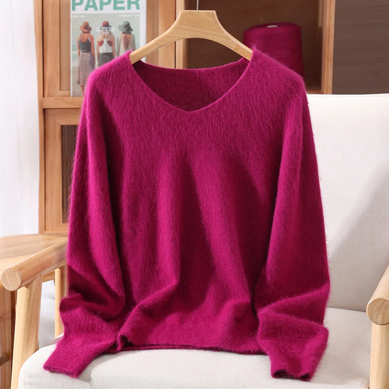 Rust red high-end female mink cashmere sweater with long sleeves and wool knit texture, featuring a loose fit for autumn and winter wear.