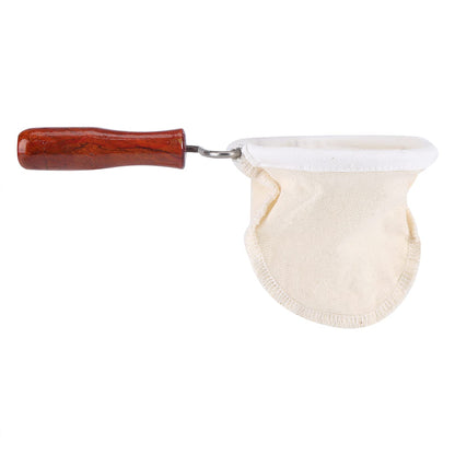 Reusable flannel coffee cloth filter with wooden handle, traditional Thai style coffee and tea strainer for home or office brewing.