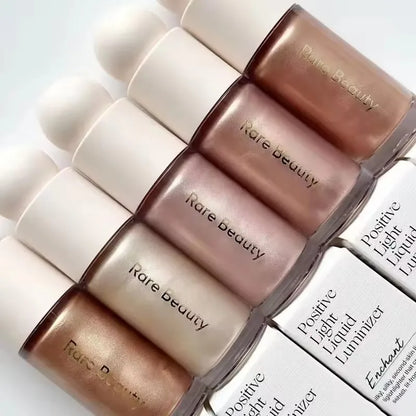 Rare Beauty Happy Hope Grace Faith liquid blush and contouring bronzer, with a matching liquid lipstick and gloss in sleek packaging.