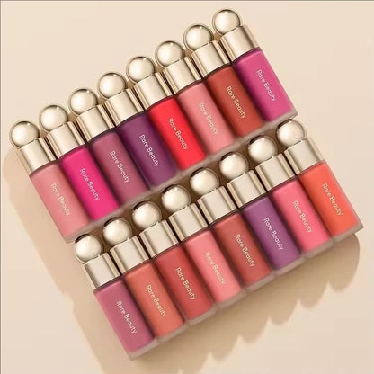 Rare Beauty liquid blush and bronzer set with soft shades, including a liquid lipstick and gloss for natural, glowing makeup looks.