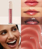 Rare Beauty liquid blusher, contouring bronzer, and glossy lipstick in a makeup palette with shades of pink and nude.