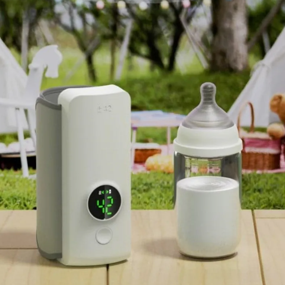 Wireless portable baby bottle warmer by BackupMyFilesNow.com, compact device for warming baby bottles on the go.