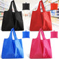 Four reusable foldable grocery bags from BackupMyFilesNow.com, machine washable, eco-friendly shopping tote bags.